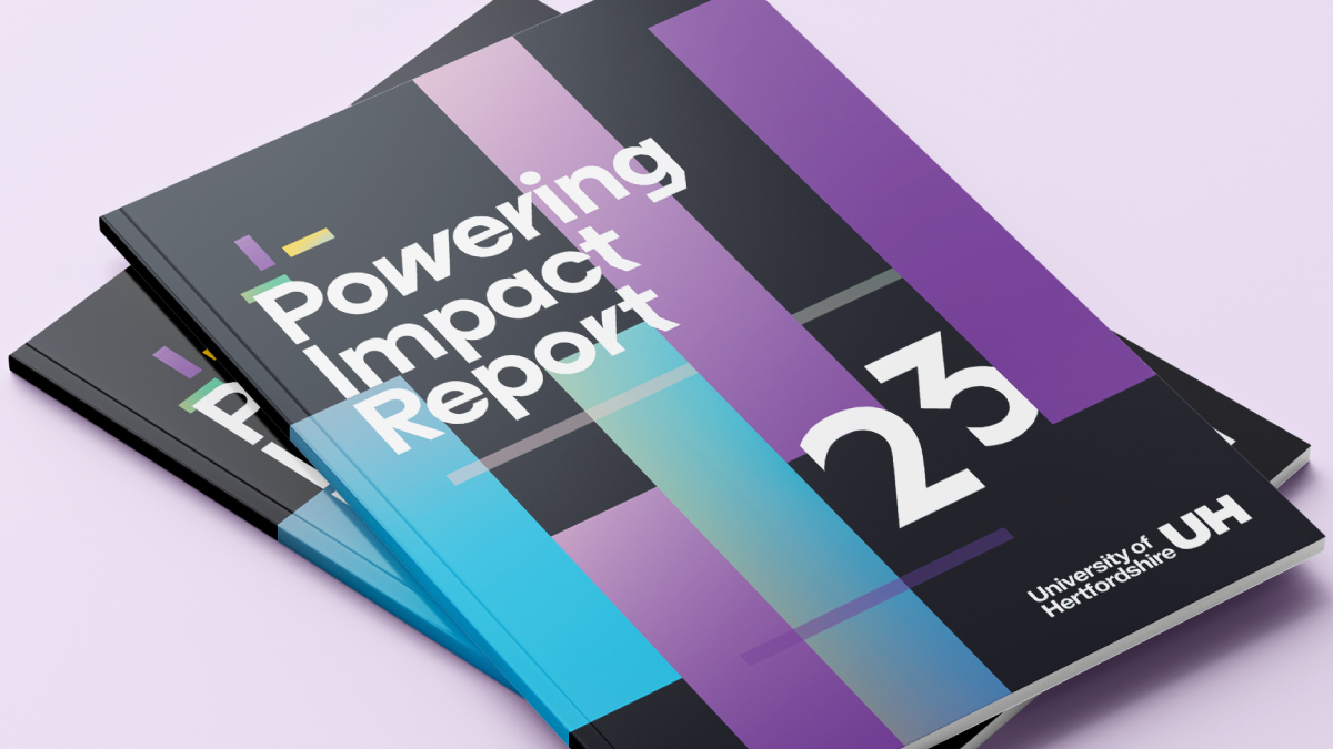 An image of our new powering impact report which uses our new branding